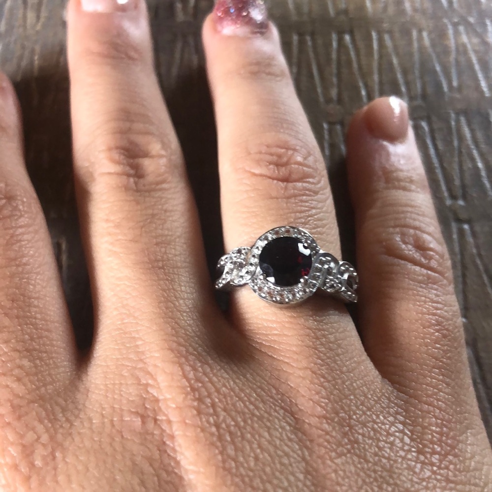 Lab created ring. Garnet like stone.